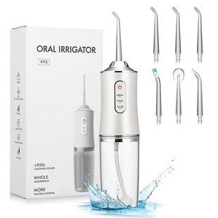 Імпульсний іригатор ORAL IRRIGATOR для порожнини рота 3 режими з насадками Білий 2104619357 фото